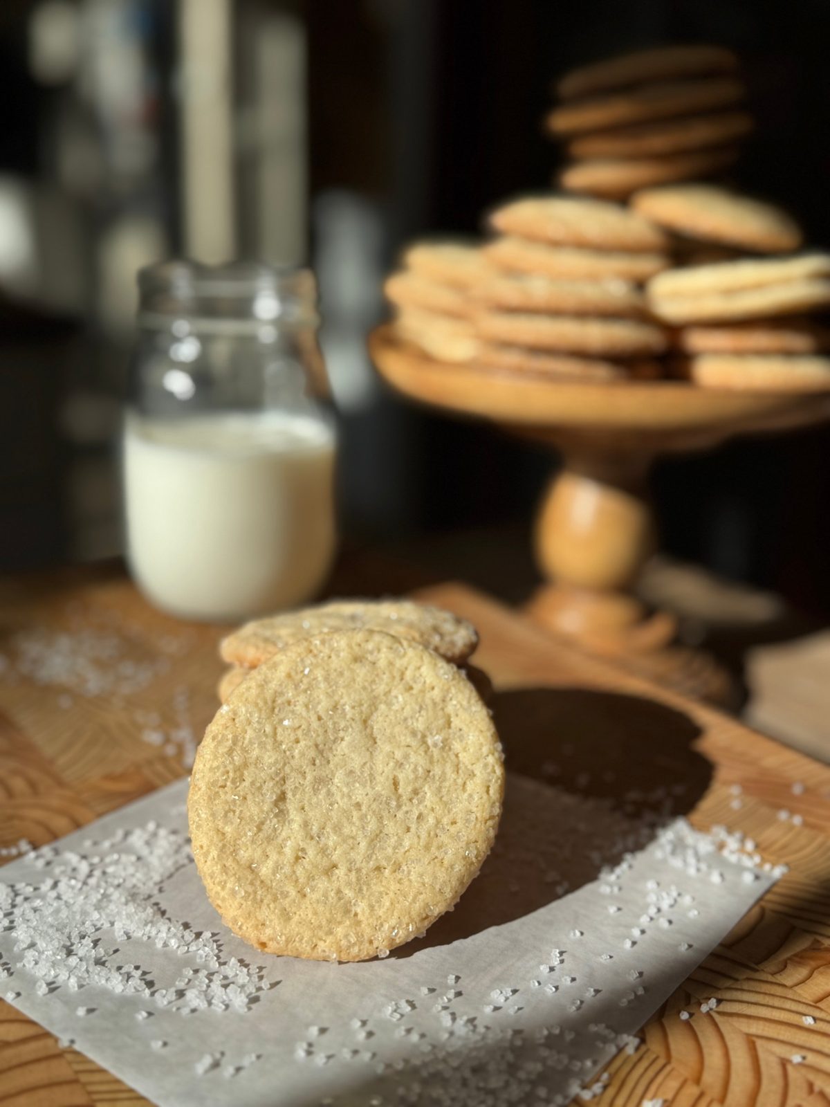 Close-up of a chewy gluten-free sugar cookie with crackly sugar top